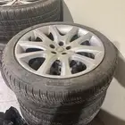 جنوط جاكوار مقاس 19 بكفراتها نص عمر اربع جنوط