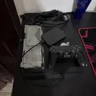 سوني فور نضيف معه هاردسك 1تيرا ويد وشريط قراند