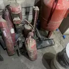 ابواب حديد ومضخة وصندوقين حديد