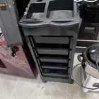 كرسي غسيل شعر وجهاز بخار وترولي حلاق