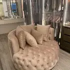 كنبه داىريه كبيره لون بيج على بنك حديده تماما لم استخدم