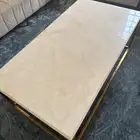طاوله رخام بيج مع ذهبي وخدمه اربعه بحاله ممتازه