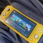 Nintendo switch yellow   مع قطعه التهكير mig switc
