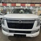 نيسان باترول بلاتينيوم 6 سلندر 2025 ابيض سقف ابيض داخل احمر