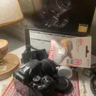 كاميرا NiKon D3500 يوجد معها شريحه اضافيه ذاكره
