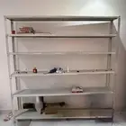رفوف مكتبة او مستودع حديد