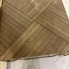 طاولة كبيرة مع أربع طاولات صغيرة