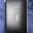 نيتندو سويتش مع اغراضه كامل وعليها حمايه بالكامل ومعه حقيبه