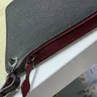 باوتش اصلي 100  من ماركة كرستشن لوبتون Christian Louboutin