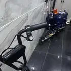 السيكل كفره الخلفي مفقوع فقط  والاسكوتر شغال بس ما يمشي