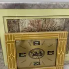 لوحات الوانها زاهيه واحده بورد وواحدة على شكل ساعه