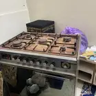 سرير يتصفط وفرن غاز