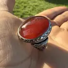 خاتم فضة بصياغة الكتف بحجررعقيق رماني