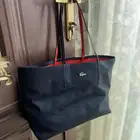 شنطة لاكوست للنساء