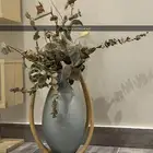 باقات ورد مواليد مع دواليب ورفوف خشب متنوع