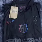 تي شيرت برشلونه ترافيس