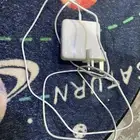 MacBook charger and iPhone 12 Pro sleeve
