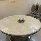طاوله طعام جديده دائريه الشكل مع رخام متحرك   وعدد 8كراسي