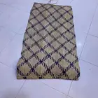 حصير من سعف النخيل وتحفة قديمة