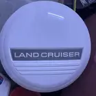 للبيع خلفية اسبير علاق لاندكروزر وغطاء اسبير نظيف