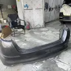 صدام اوبتما خلفي رمادي وكاله