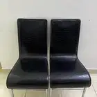 كرسيان جلد حديد