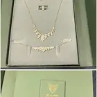 طقم اكسسوار ذهبي من ماركة روبي روز.