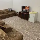 غرفة نوم وكنب جلوس