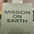 ساعة اوميغا سواتش كوكب الارض   Mission on Earth