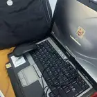 لابتوب مع جميع اغراضه طابعه و ولوحة مفاتيح وموس