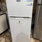 طاوله وثلاجه وسط للبيع