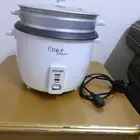 قدر جهاز كهربائي لطبخ الرز و شوايه طعام كهربائيه