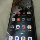 جوال ردمي نضيف فيه كسر من ورا مياثر