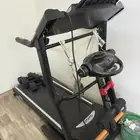 Treadmill with a Massager