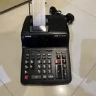 الة حاسبة كهربائي مع وزق طابعة مستعمل