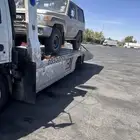 سطحه الرياض لنقل السيارات داخل وخارج الرياض