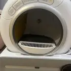 جهاز تنظيف مخلفات القطط كهربائي