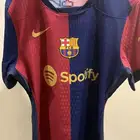 فنيلة برشلونة من متجر برشلونة الرسمي باسبانيا