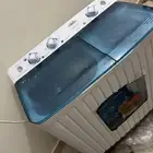 غسالة ملابس 5 كيلو مشكلتها تسرب واطارها فكيته مو موجود وتحت