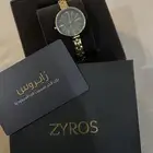 ساعة زايروس نسائية فخمة بلون أخضر وذهبي ما انلبست