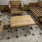 طاولة خارجيه خشب   بحالة جيده.