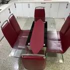 طاولة طعام 6كراسي من هوم سنتر مع غيارين لبس للكراسي نضيفة