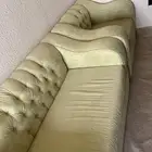 كنب لونه اخضر كنب ظهر مع اغراض في كرتون مع كراسي عربيه