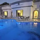 استراحة لاقينا هوم اشجار وزرع ومسبح