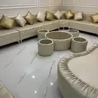 كنب جلد سكري مع طقم طاولات طقم وخداديات