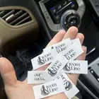 طباعة لوقو جلد للعبايات ليبل قماش اكرليك