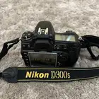 كاميرا Nikon D300s وعدسات تصوير وفلاتر وفلاش وبطاريات