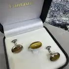 طقم كبك وخاتم فضه عيار 925 بحجر عين القط الاصفر موديل جديد