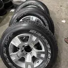 كفرات برجستون مع جنوط فتك نيسان صني مقاس 17-65-275