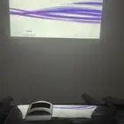 بروجكتور BenQ بالاضافه الى جهاز دي في دي وسماعات مسرح منزلي